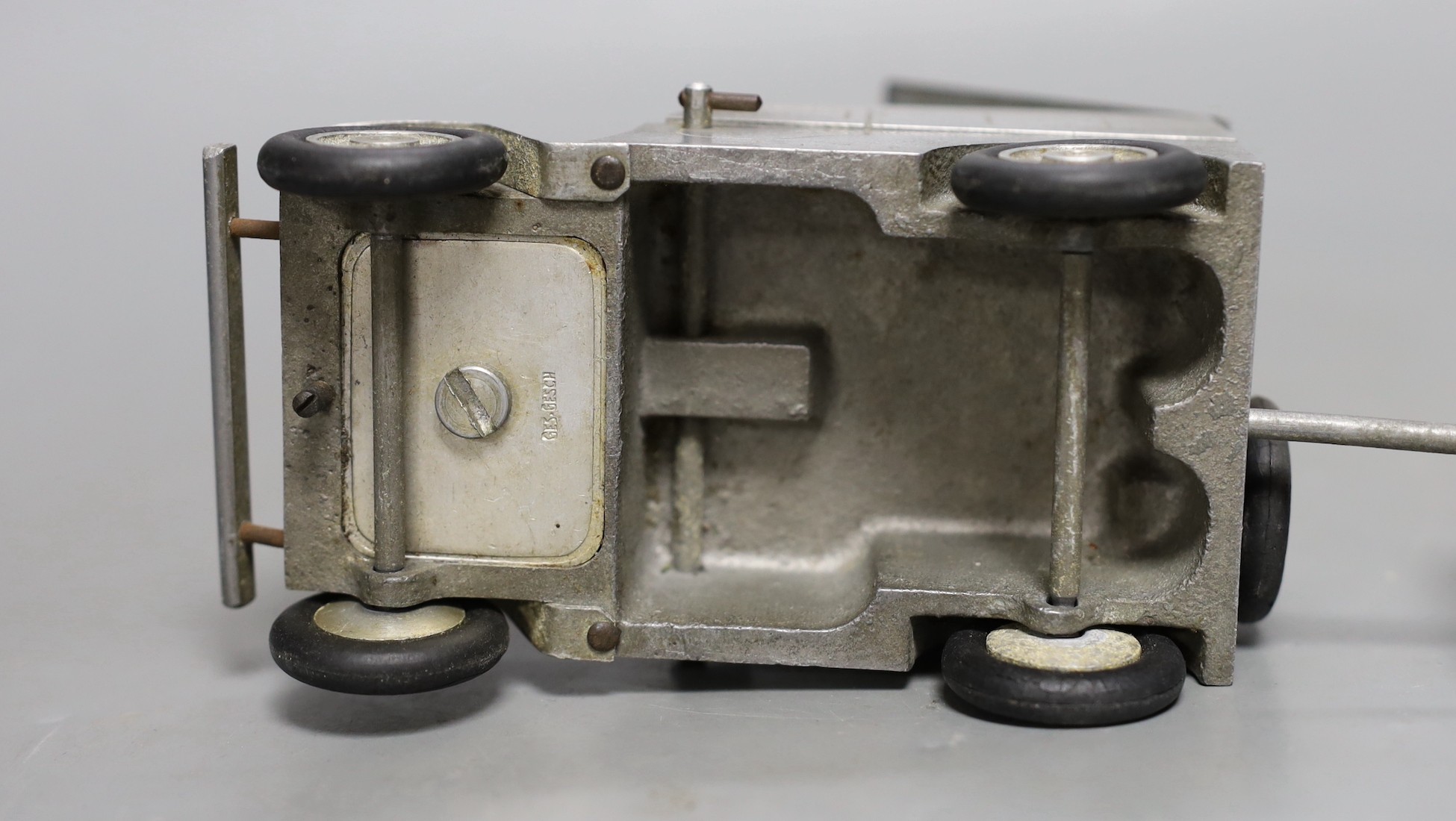 A German cast metal ‘Willy's Jeep’ cigarette case, ash tray and lighter novelty, early post war, 23cms wide